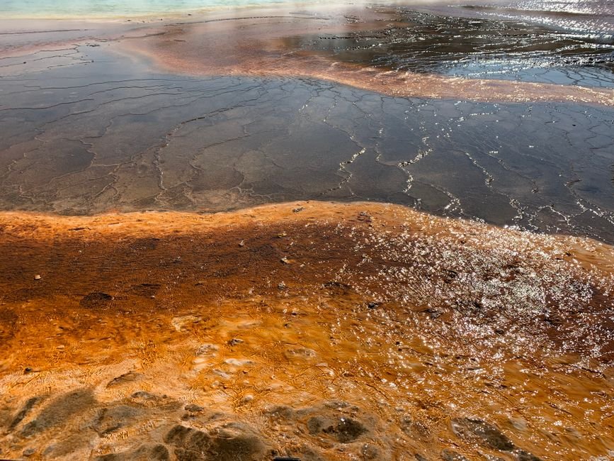 Explore the stunning colors of a geothermal landscape captured in vivid detail.